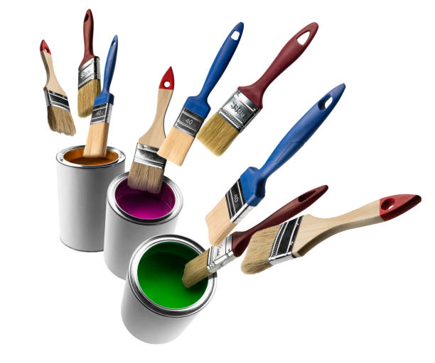 istock Paint cans and levitating brushes on a white background 1384427740