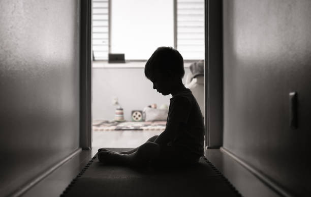 Sad and lonely little boy.
