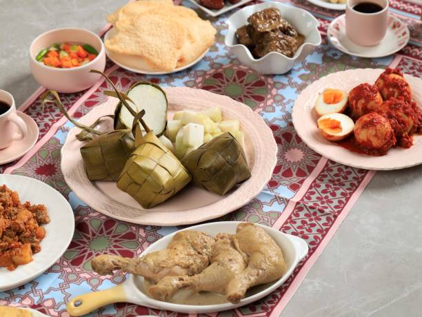 istock Ketupat Lebaran Set, Full Package Menu Served during Lebaran Eid, on the Grey Marble Table 1384440679