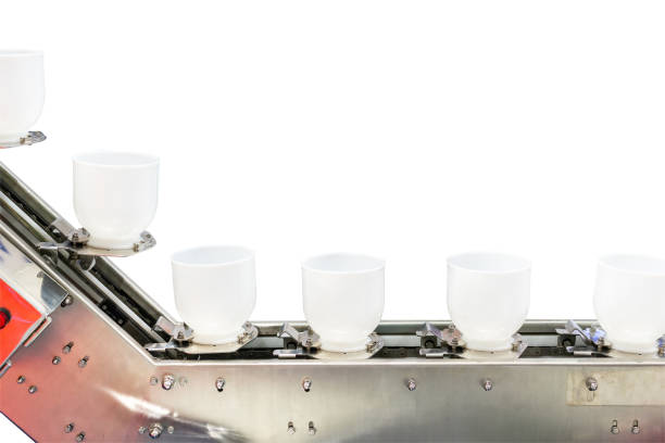 buckets chain or bowl commercial conveyor (cup feeder) for material transporttation industrial isolated on white background with clipping path stock photo