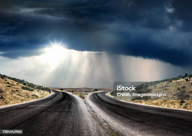 Empty Forked Road Over Dramatic Stormy Sky Stock Photo - Download Image Now - Separation, Road, Calm Before The Storm