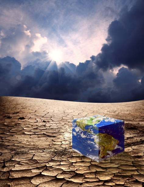 istock Climate change concept of cube shaped abstract Planet Earth 1384443128