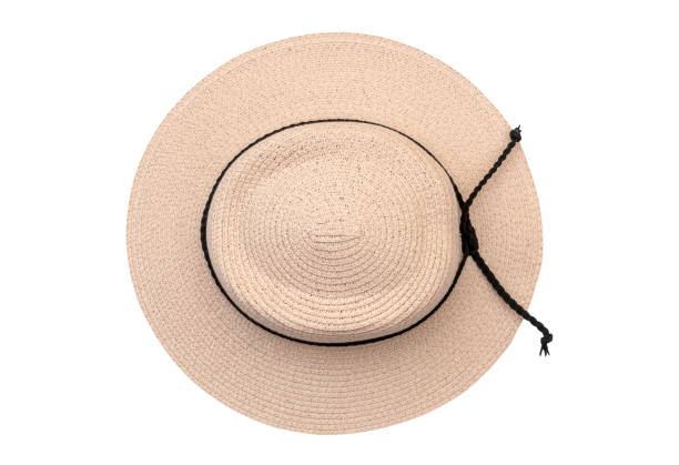 istock Woman's straw beach hat isolated on white. 1384443831