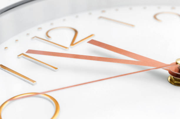 istock Face of white clock. Close up. 1384444017