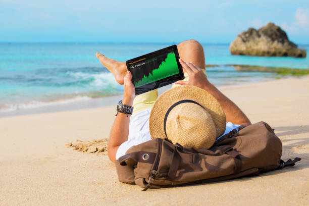 istock Man looking at his investment portfolio performance 1384447517