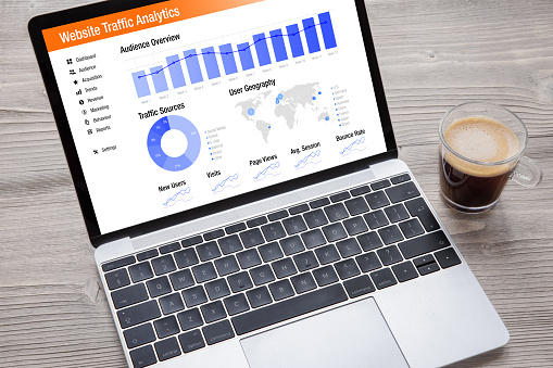 Website traffic analytics data on laptop computer