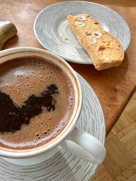 traditional turkish coffee and biscuit with nut on wooden table