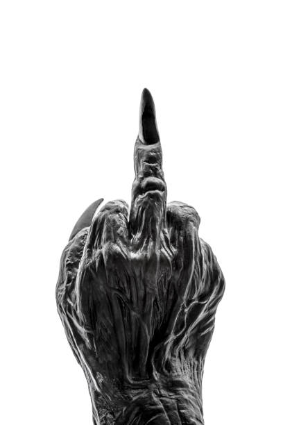 istock Creepy monster hand showing a middle finger isolated on white background 1384449518
