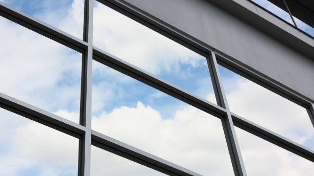 istock the tower design using big window exteroir . the geometry square design with glass out side building 1384450314