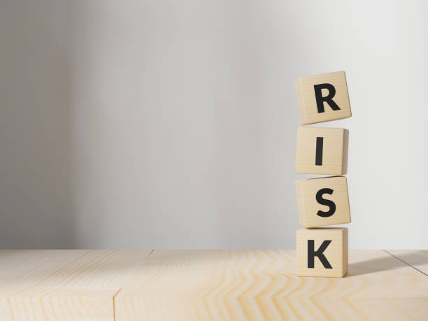 istock Wooden cubes with risk word on table. Risk management concept. 3D illustration rendering. 1384455136