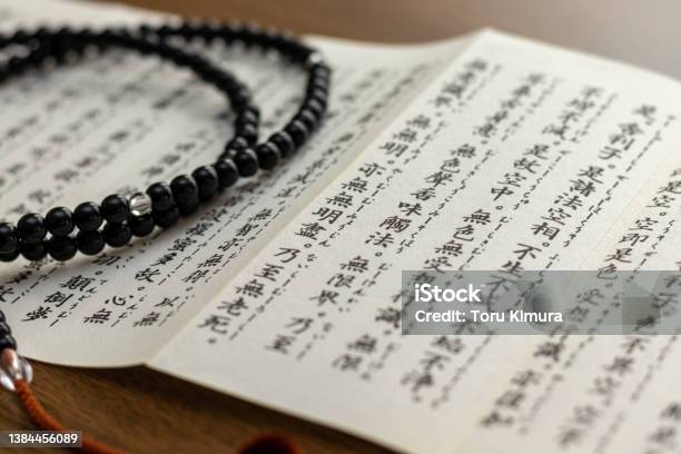 Close Up On Buddhist Sutra Stock Photo - Download Image Now - Prayer Beads, Book, Buddhism