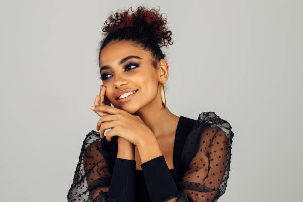 istock Beautiful afro woman with perfect make-up 1384468297