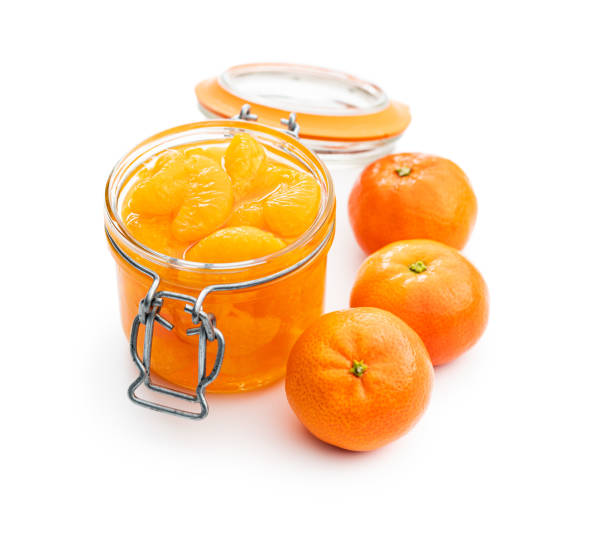 istock Canned tangerine. Pickled mandarin fruit. 1384477089