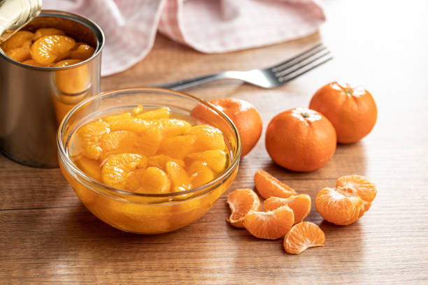 istock Canned tangerine. Pickled mandarin fruit. 1384477149