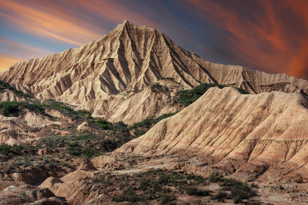 Sunset in Bardenas Reales, erosions formed by water and wind over millions of years, Navarra, Spain Sunset in Bardenas Reales, erosions formed by water and wind over millions of years, Arguedas, Navarra, Spain barron gorge national park stock pictures, royalty-free photos & images