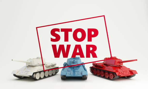 istock STOP WAR large letters in red frame. up to ask for cooperation to stop the war on a white background and red, blue, yellow tanks, the 3d render 1384496142