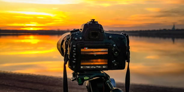 istock The camera shoots a sunset video on the lake 1384496694