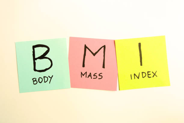 istock Handwritten acronym BMI isolated on white background 1384517922