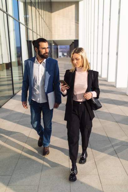 istock Young business people spending time together outdoors 1384519032