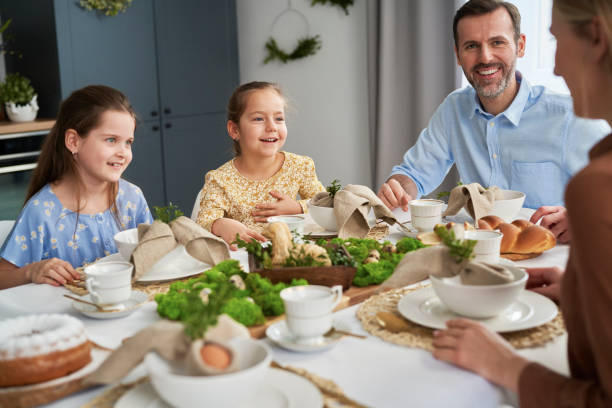 istock Caucasian family of four celebrating over easter table 1384519093