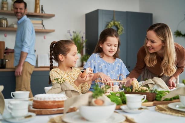 istock Caucasian family about to start an easter dinner at home 1384519181