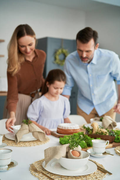 istock Caucasian family before an easter dinner at home 1384520395