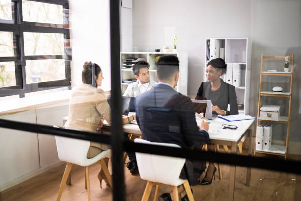 istock Diverse Business People Discussions In Office 1384520938