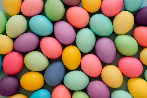 Easter eggs painted in pastel multicolored tones
