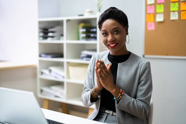 istock Woman Clapping In Online Video Conference Business 1384525842