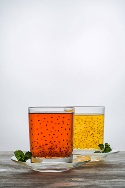 Natural drink with basil seeds. useful for health. Proper nutrition. Strawberry and mango juice stock photo