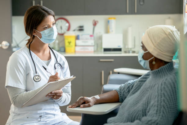 istock Talking Over Cancer Treatment Symptoms 1384528171