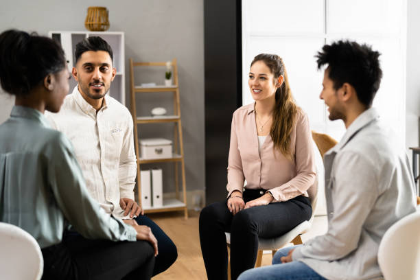 istock People Listening To Young Woman Talking About Her Problems 1384530194