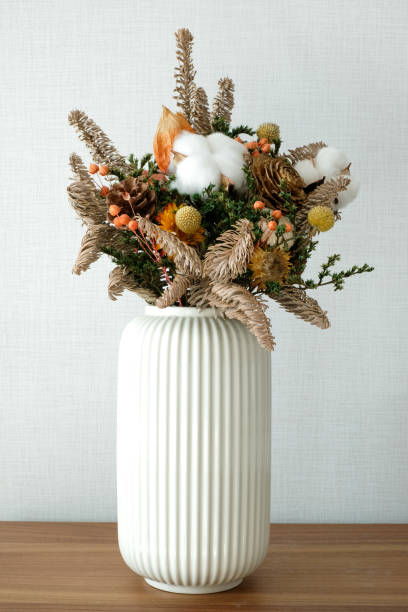 istock Colourful dried flower in white vase 1384535269