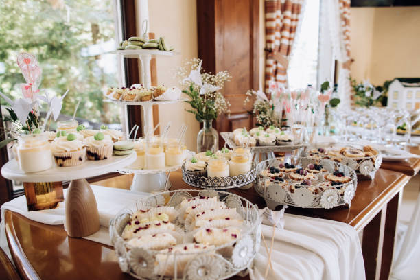 istock Table with a variety of sweets. Cookies, chocolate, cakes, eclairs 1384545122