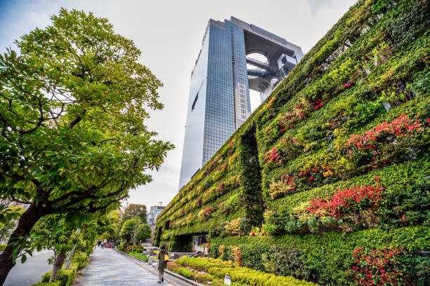 umeda sky building in osaka, japan - landscape business built structure building exterior stock-fotos und bilder