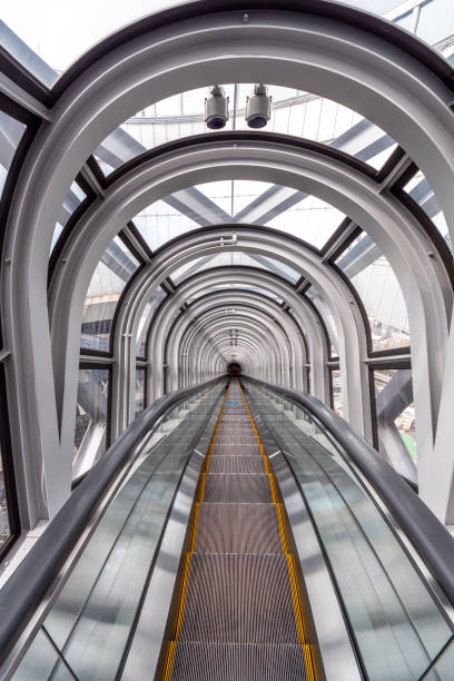 Moving staircase in a glass tunnel