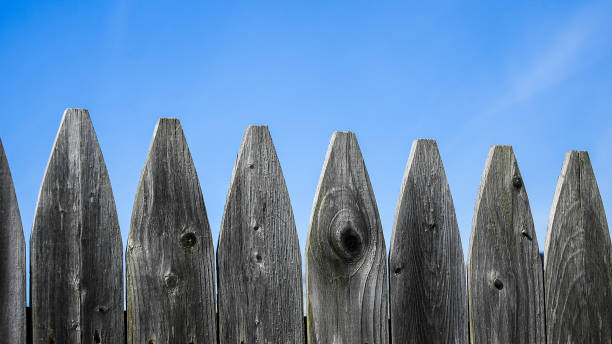 istock Wooden fence with nice blue sky 1384556920