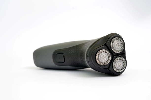 istock New Electric shaver closeup on white background. 1384560923