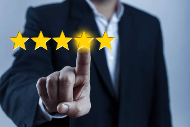 istock man giving check mark on rating star for feedback 1384565048