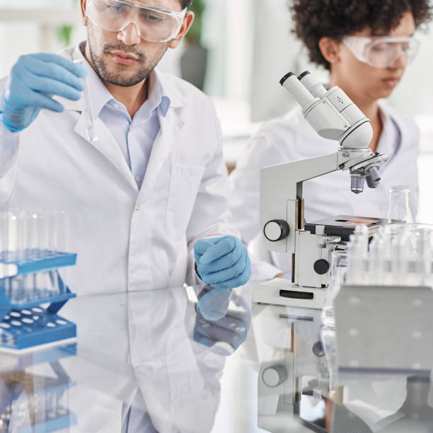 scientist testing samples in a laboratory. close-up stock photo