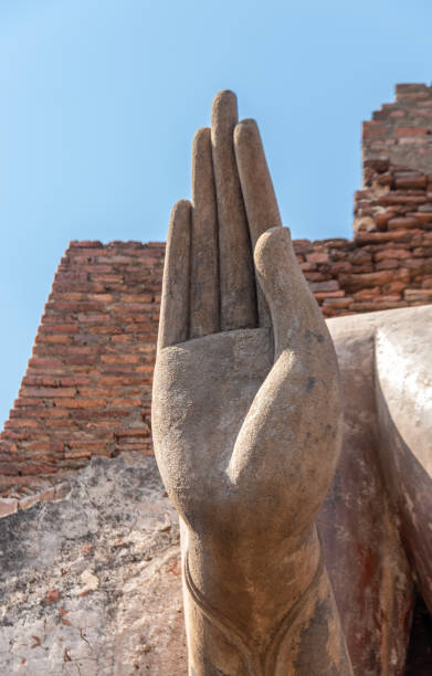 istock Buddha hand peace symbol at Sukhothai 1384570344