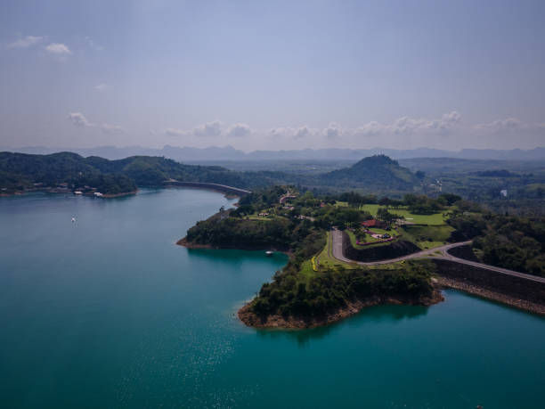 istock Hydroelectric dam with clear blue water in Thailand 1384570426