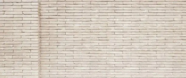 Photo of Beige,White brick wall background .Soft focus and vintage color toned.
