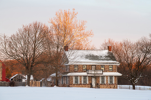 Worcester, USA - January 29, 2022. Peter Wentz Farm at Sunset after snowstorm, Worcester, Pennsylvania, USA