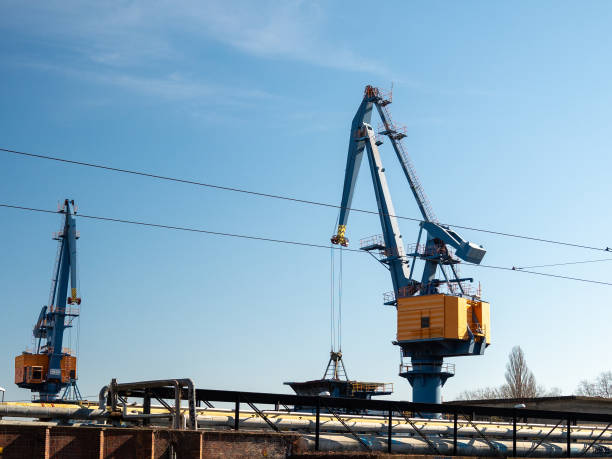 istock Port crane at a thermal power plant 1384576261