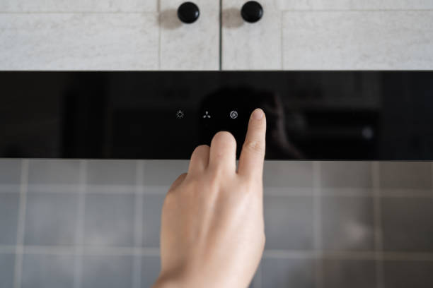 istock Press the hood button with your hand 1384583810