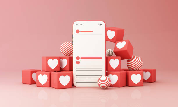 istock smartphone with heart emoji speech bubble cube box and frame message on screen. Social network and mobile device concept. Graphic websites, web banner on pink background. 3d rendering illustration 1384585673