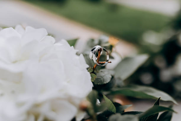 istock wedding rings lie on a bridal bouquet 1384587238