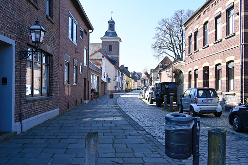 Krefeld, Germany, March 10, 2022 - The harbor street with the evangelic church of Johannes in Krefeld - Linn