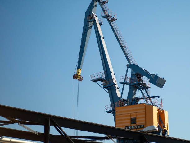 istock Port crane at a thermal power plant 1384588905